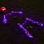 Esqueleto Iluminado Halloween con Luces LED Púrpura y Ojos Rojos